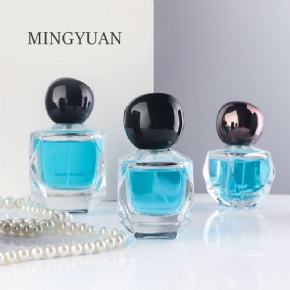 High Quality 30ml 50ml 100ml Polyhedron Glass Perfume Bottle Refillable Perfume Atomizer Unique Caps Designer Perfume Container